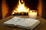 8554719-an-open-bible-on-a-table-in-with-a-fireplace-in-the-background (1)